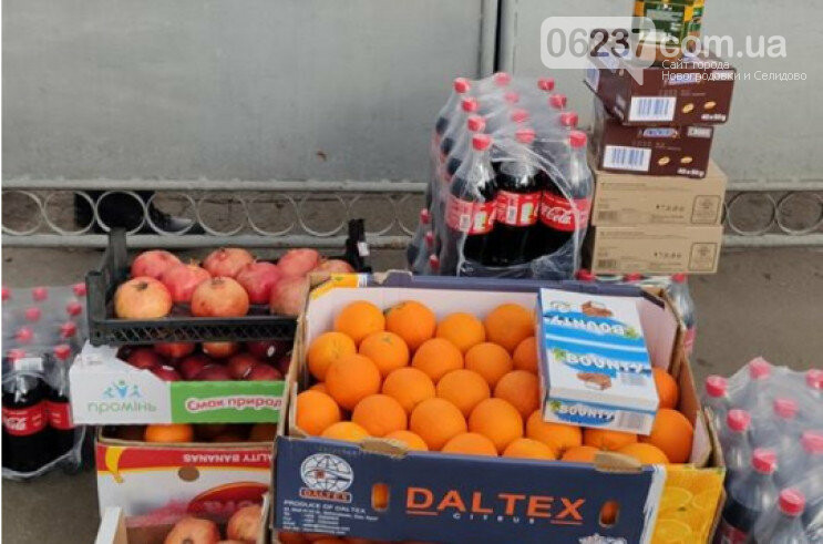 У Нових Санжарах переселенці з Донецька привезли фрукти і напої українцям з Уханя, фото-1